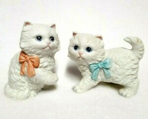 kittens with blue and pink bows